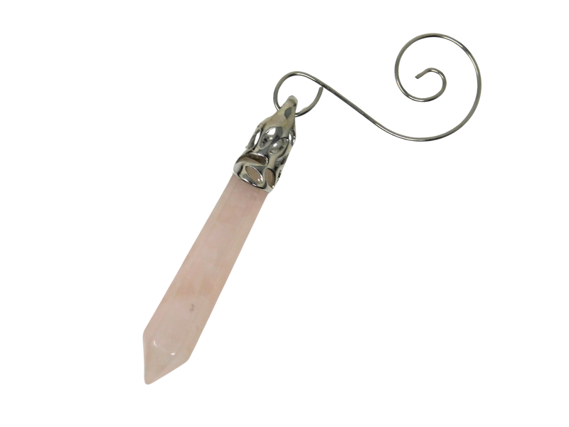 Crystal ornament with rose quartz and silver top on a white background