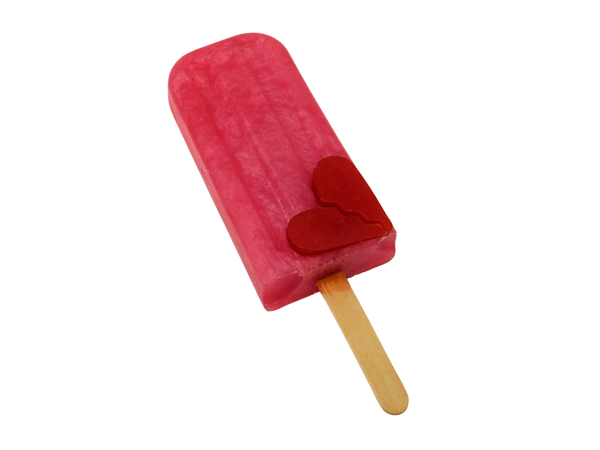 pink ice pop shaped soap with red broken heart soap on bottom right corner